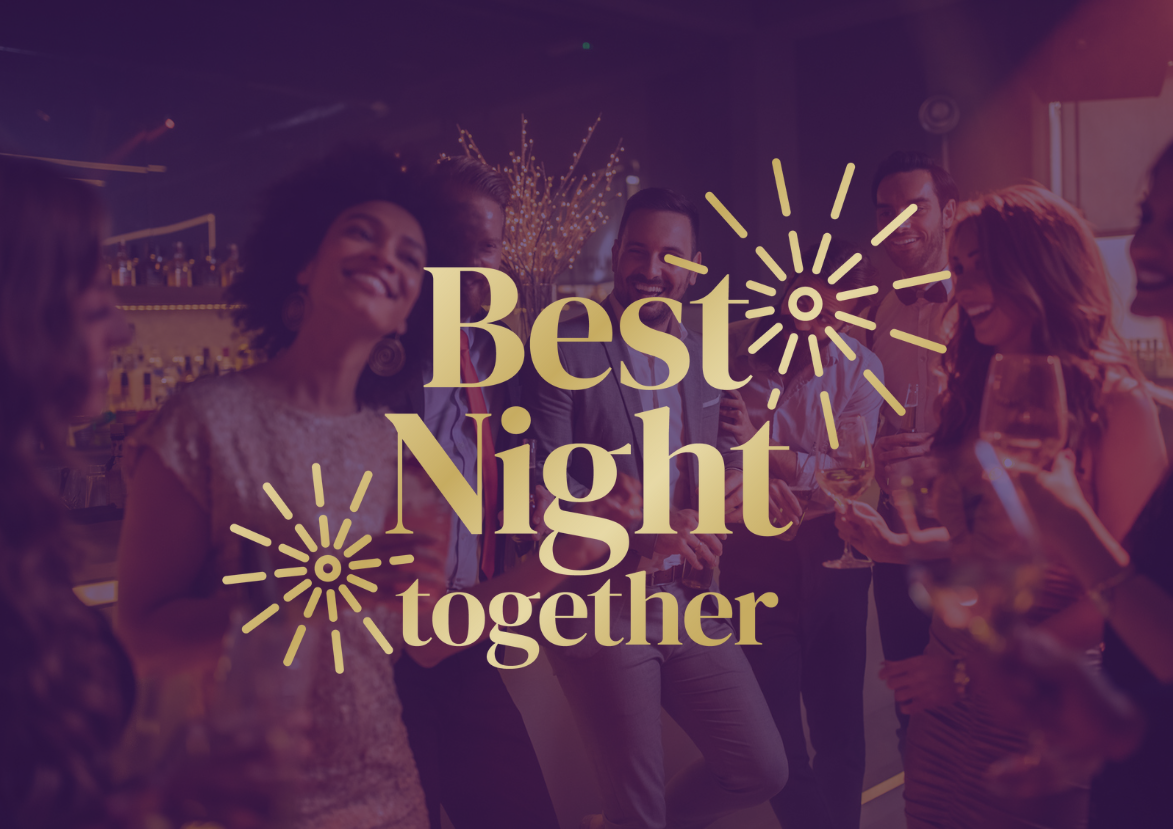 A group of people dressed up and smiling while holding drinks at a lively party. Text in front reads, 